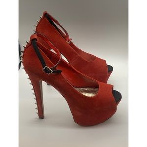 Wild pair red platform Peep toe heels w spikes